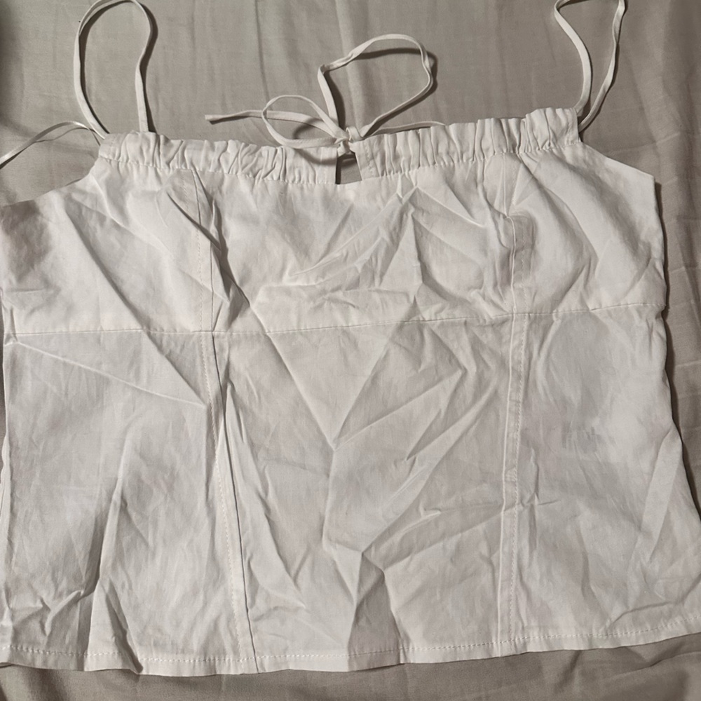 Cute top with tie and side zipper